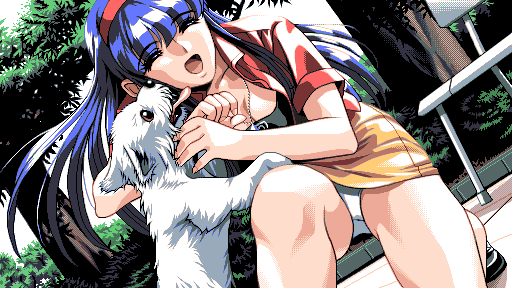 Kanna, laughing and smiling, kneels to pet a dog who is licking her cheek.